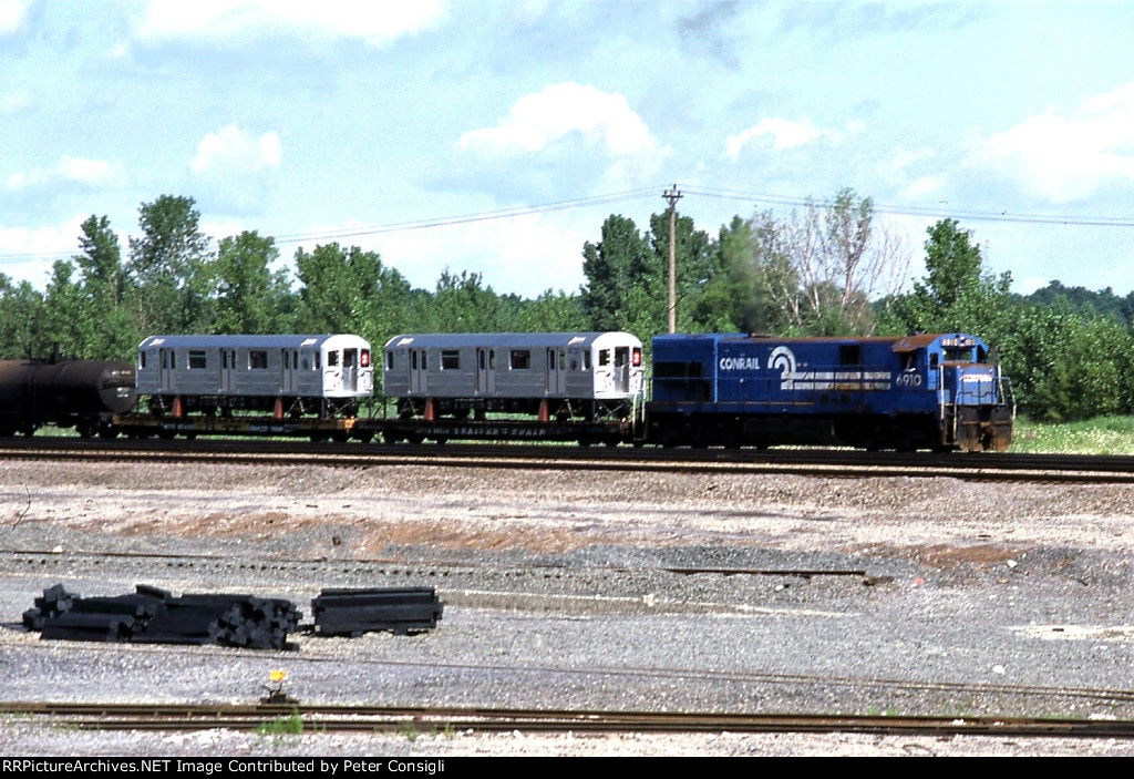 CR 6910 & MTA (NYCTA) R62A Subway cars on Flatcars